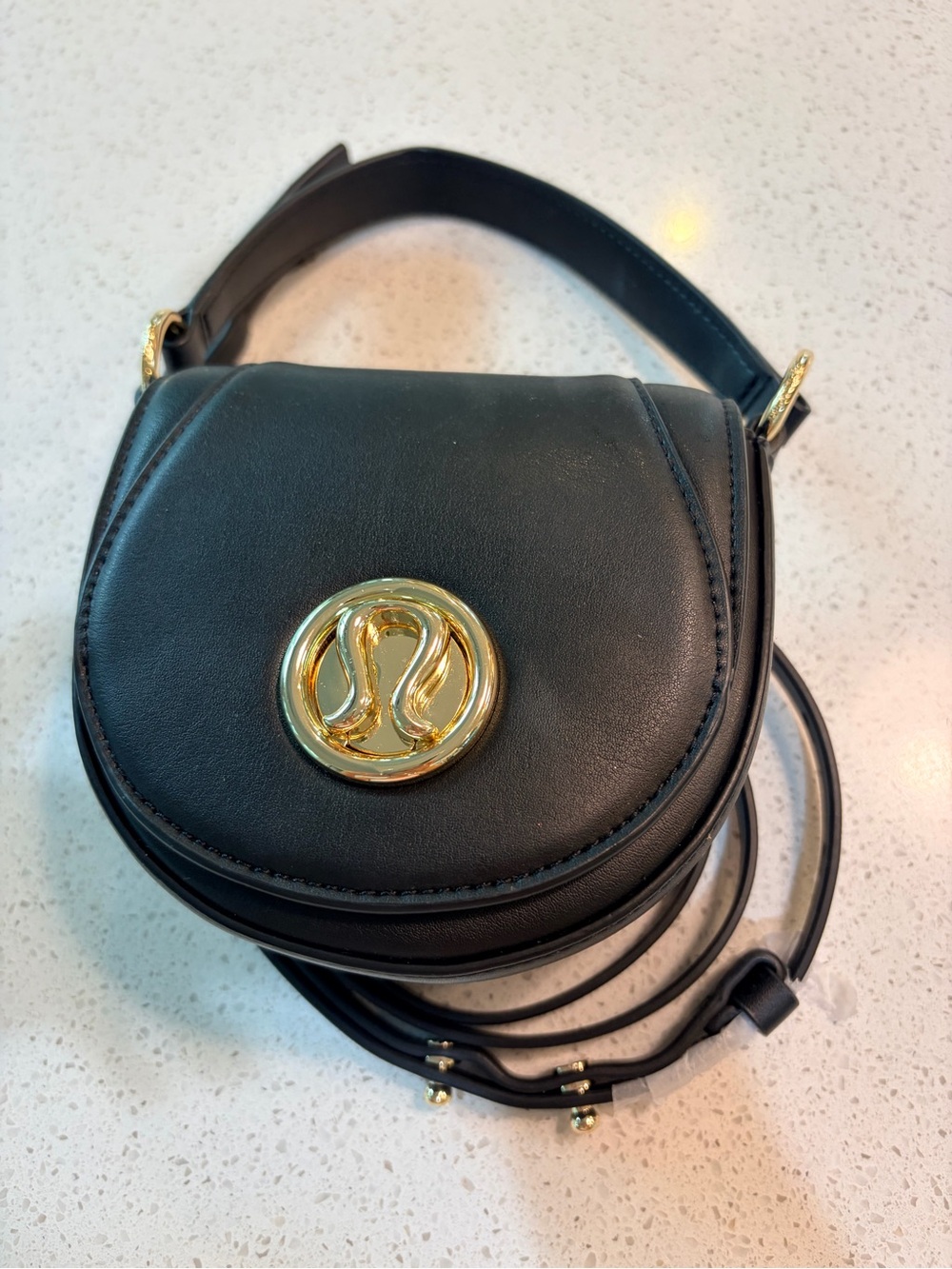 lululemon athletica Black Leather Crossbody with Gold Logo Accent